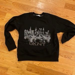 Woman’s DKNY studded sweat top